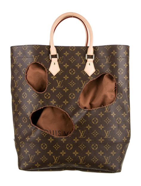 louis vuitton bag holes